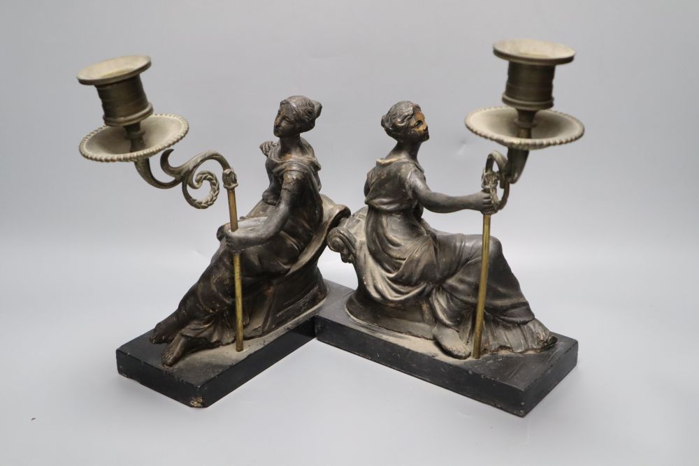 A pair of Regency bronzed plaster figural candlesticks, height 27cm